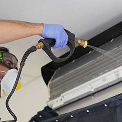 step-4 Indoor fan coil is soaked, scrubbed and thoroughly washed out with water