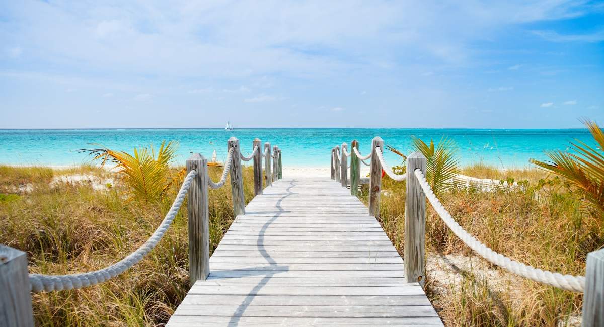 Wooden bridge to the beach