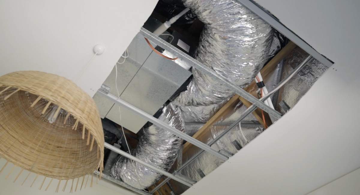 Ducted air conditioning stored in the ceiling